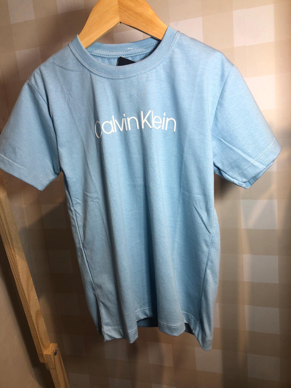 Camiseta CK Tamanho 8 - Última Peça