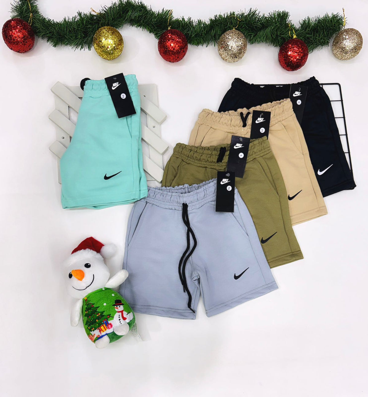 Bermuda Moletom NK- Última peça